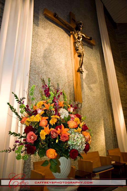 colorful floral bouqeut in the church at St Rose of Lima Catholic Church. 
