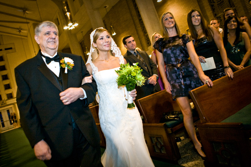 Father of the bride walking the gorgeous bride down the aisle at St Michaels Catholic Church.