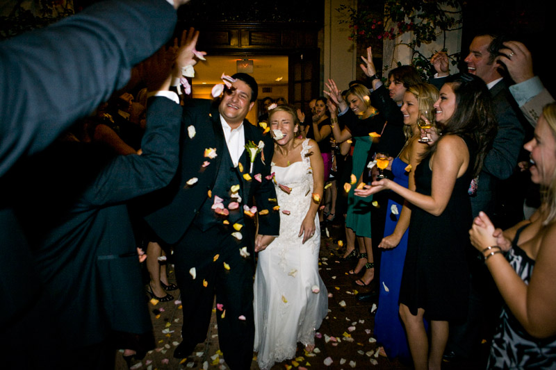 Bride and grooms grand exit under a shower of rose petals at the Courtyard on St James. 