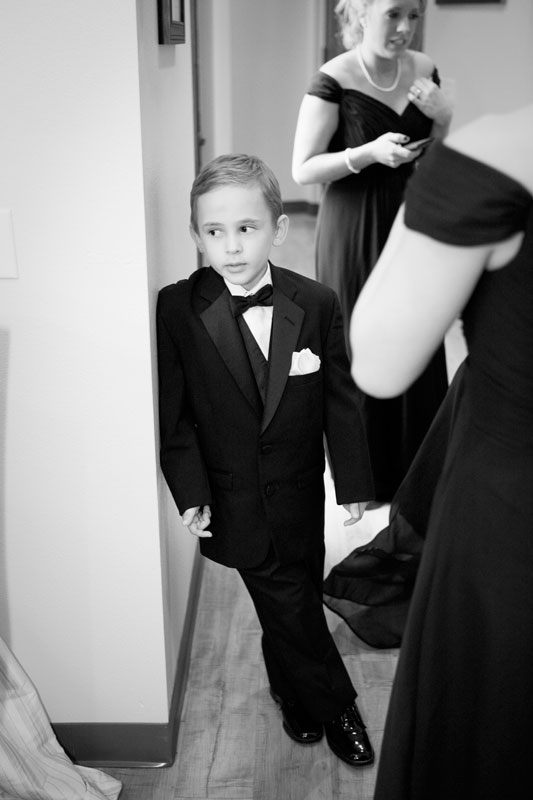 Ring bearer looking into the brides room.