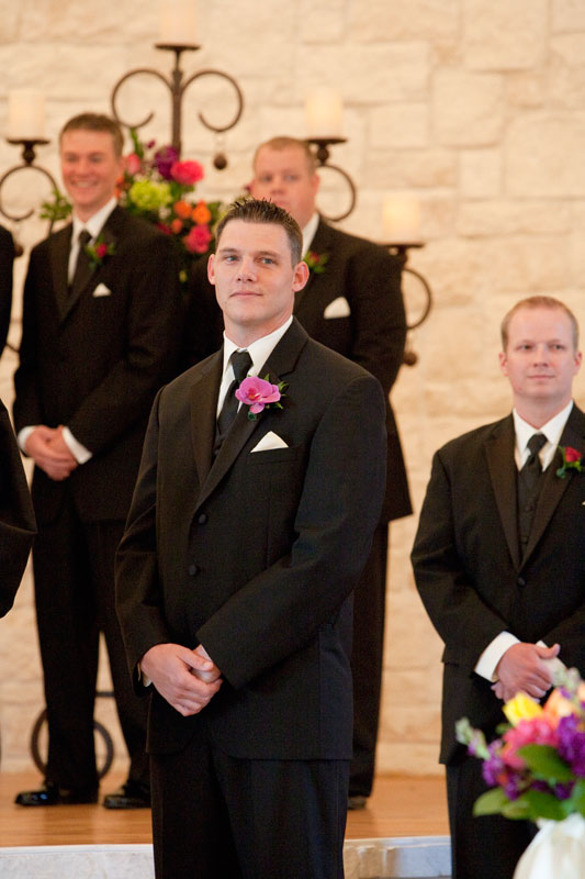 Handsome groom waiting at the altar for his bride. 