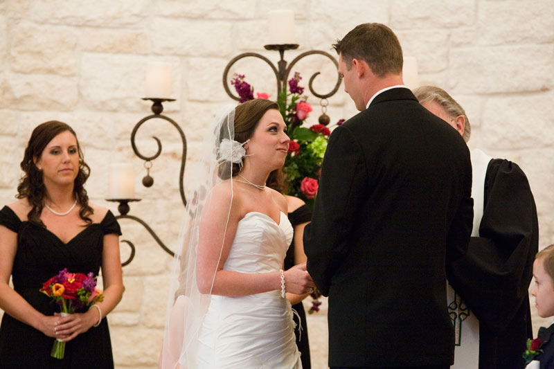 Beautiful bride gazing into her grooms eyes during their wedding ceremony at Briscoe.