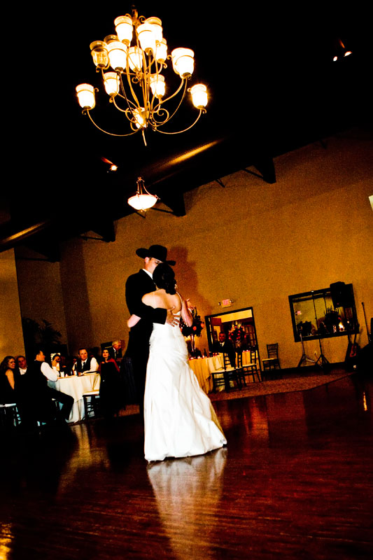 Cowboy's first dance with hsi new bride during the reception at Briscoe Manor. 