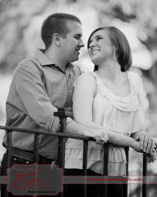 Couple in love looking into each others eyes during their engagment session.