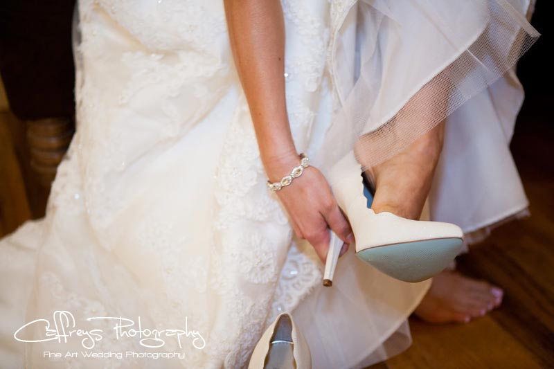 Pecan Springs Events Wedding bride putting on shoes